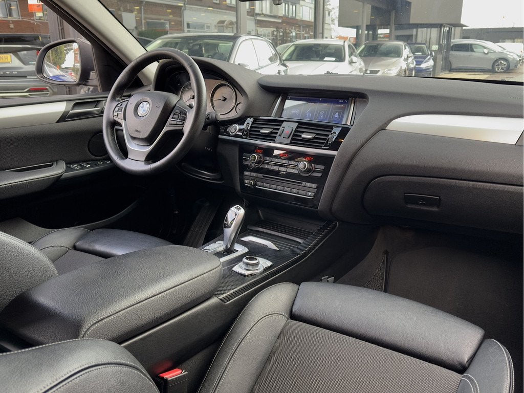 BMW X4 xDrive20i 184PK AUT8 EXECUTIVE M-SPORT LEDER NAVI AIR, Auto's, BMW, Gebruikt, 2000 kg, Leder en Stof, X4
