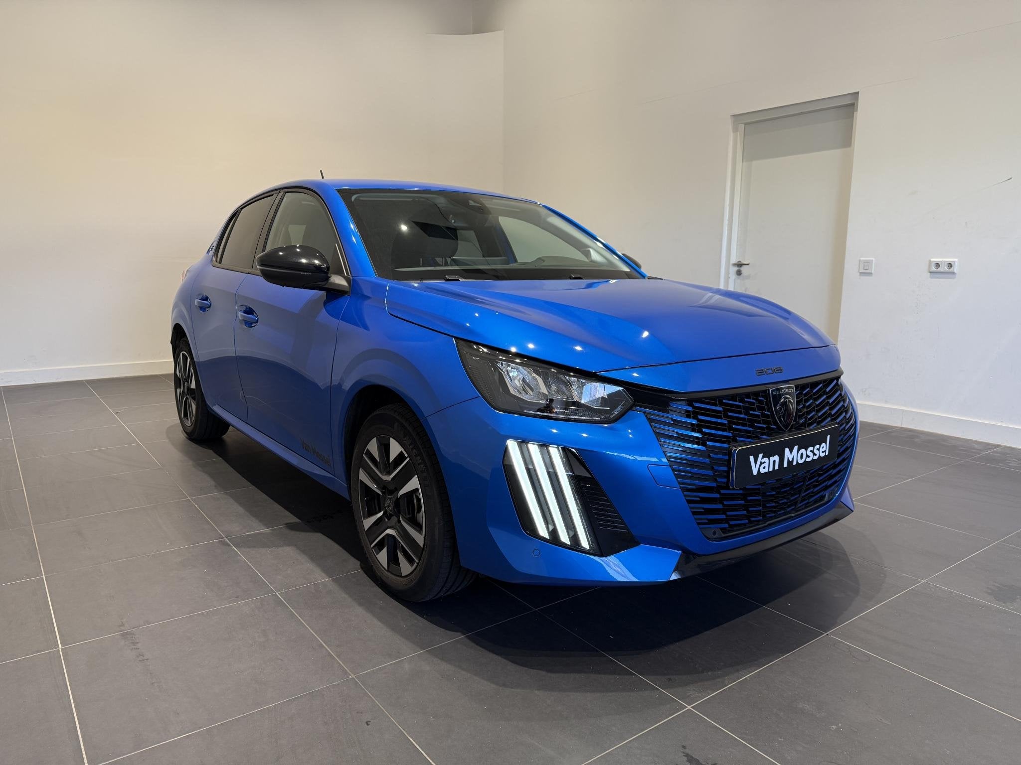 Peugeot e-208 E-Style | Stoelverwarming | Apple Carplay & An, 12 maanden, Blauw, Leder en Stof, Origineel Nederlands