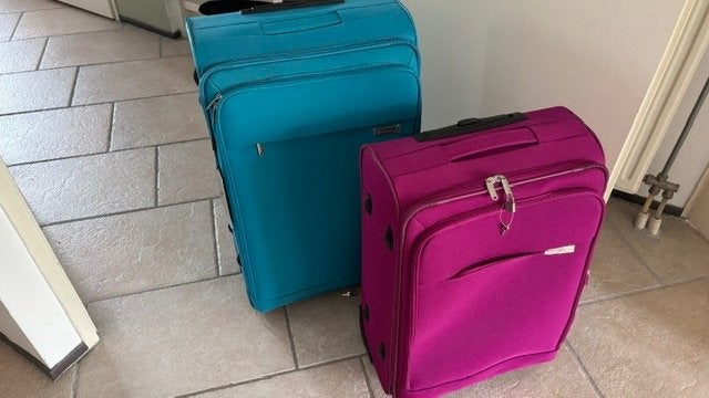Travelite koffers trolley turquise en fuchsia stof 84 l en 5, Ophalen, Nieuw, Overige materialen, Uitschuifbare handgreep