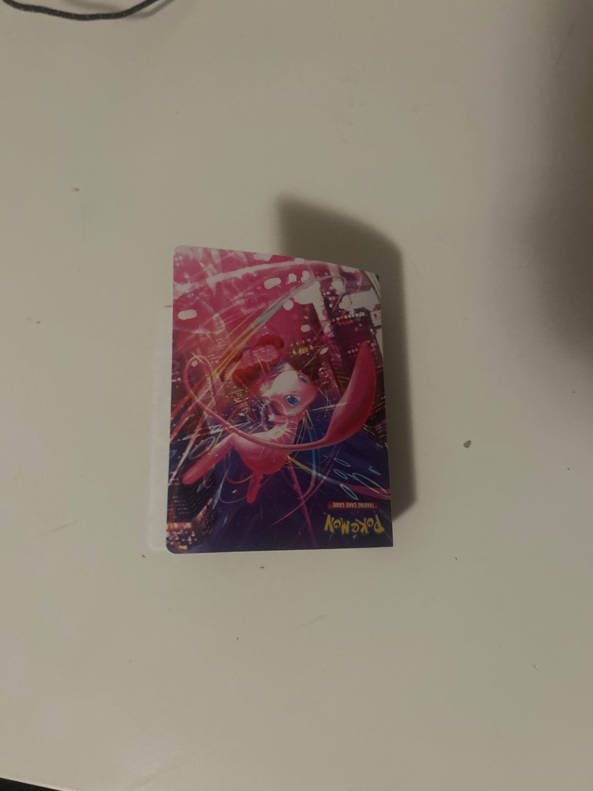 Pokémon Kaarten Mini Album met Mew Sleeves en 60 Kaarten, Ophalen of Verzenden, Gebruikt, Sleeves of Kaarthoesjes
