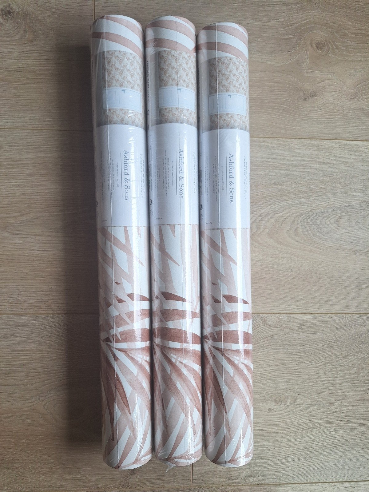 Ashford & Sons Vliesbehang Marsha Terra - Palmbladeren, Bladeren, Natuurlijk, Overige merken, Ophalen of Verzenden