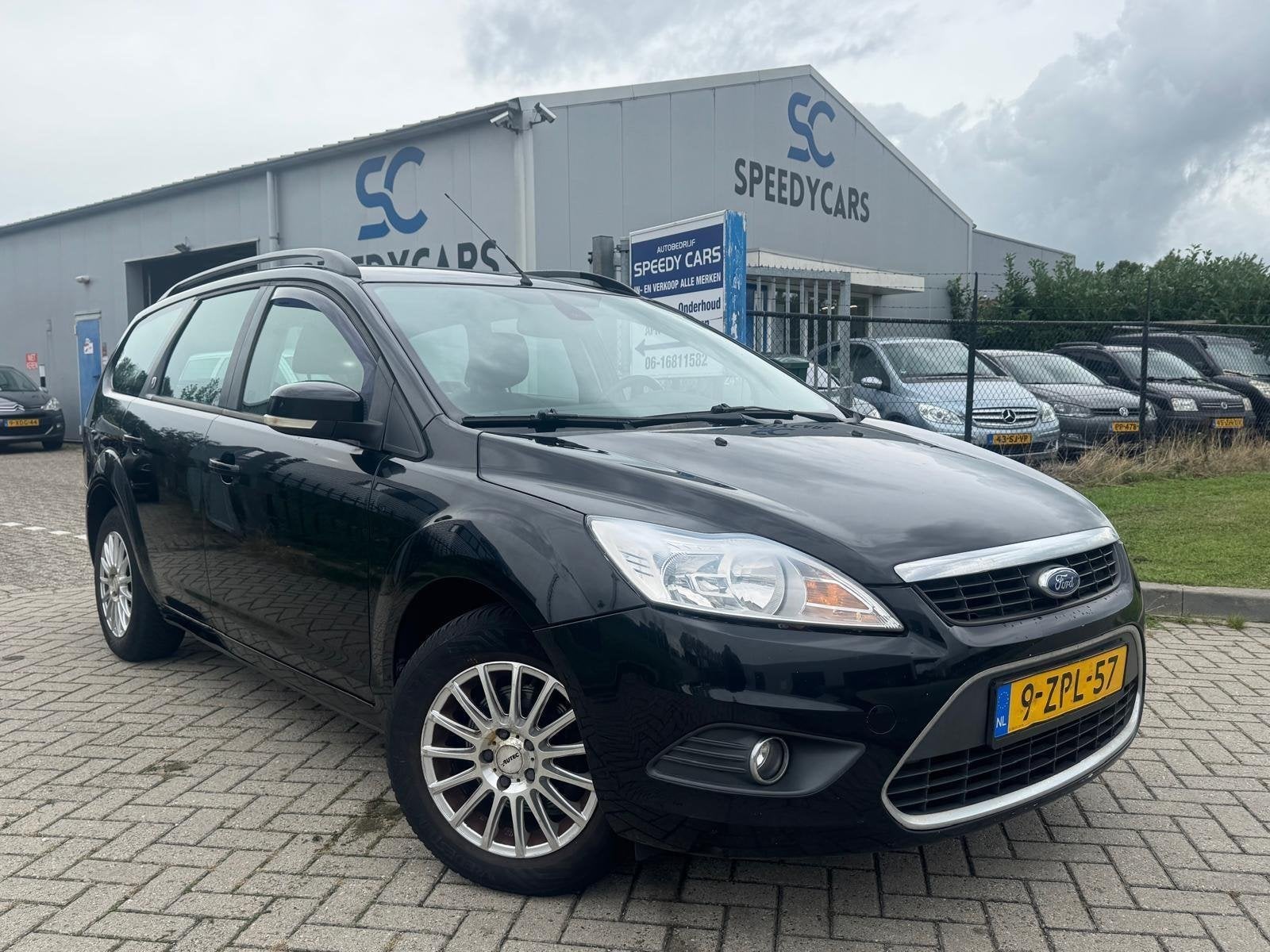 Ford Focus Wagon 1.6 TI-VCT Cruise Clima PDC Ghia, Auto's, 1596 cc, Gebruikt, Zwart, 4 cilinders