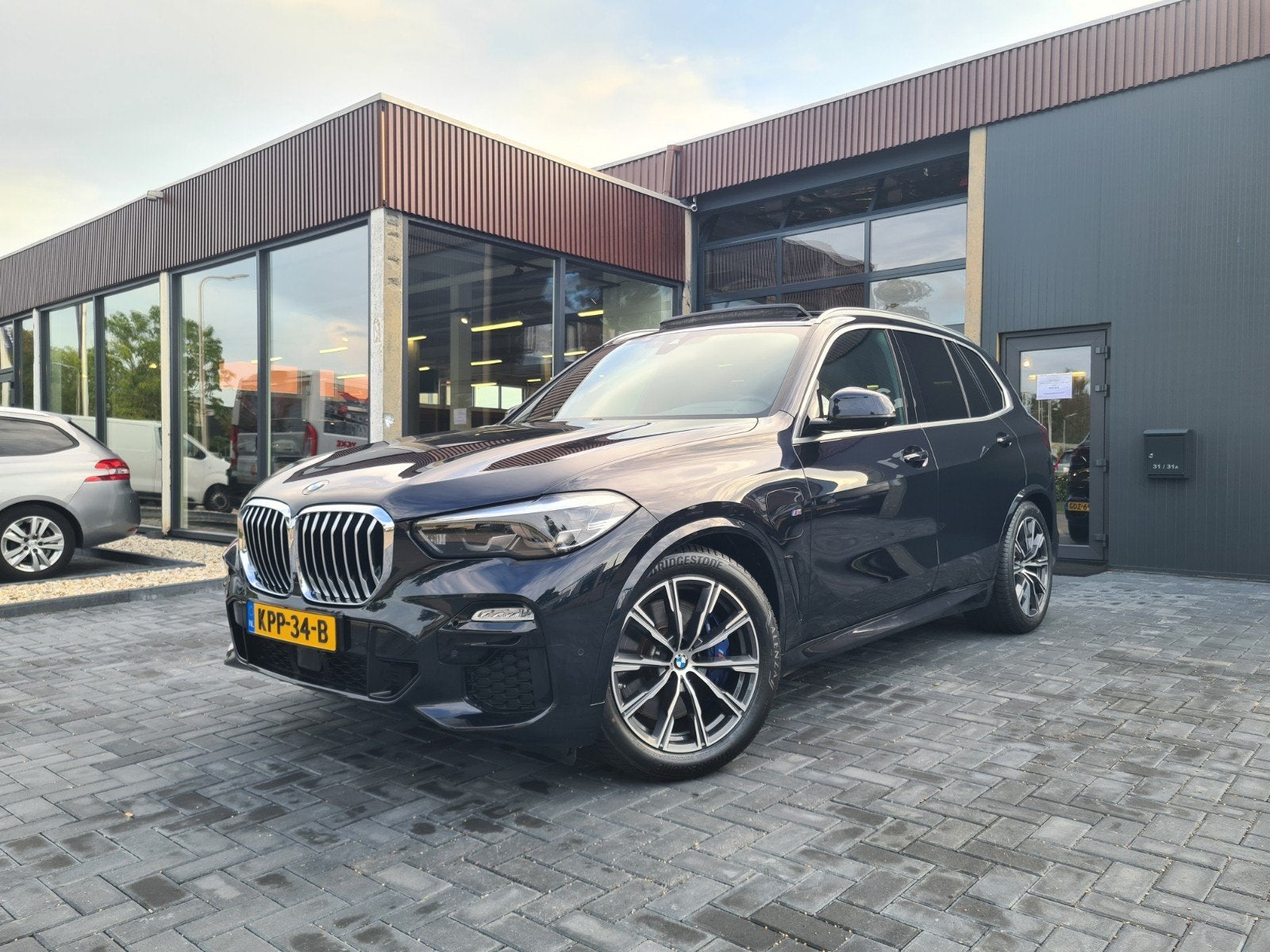 BMW X5 45e 394PK Hybrid 2020 Zwart M-Sport Pano Trekhaak, Dealer onderhouden, 77 km/l, 394 pk, Zwart