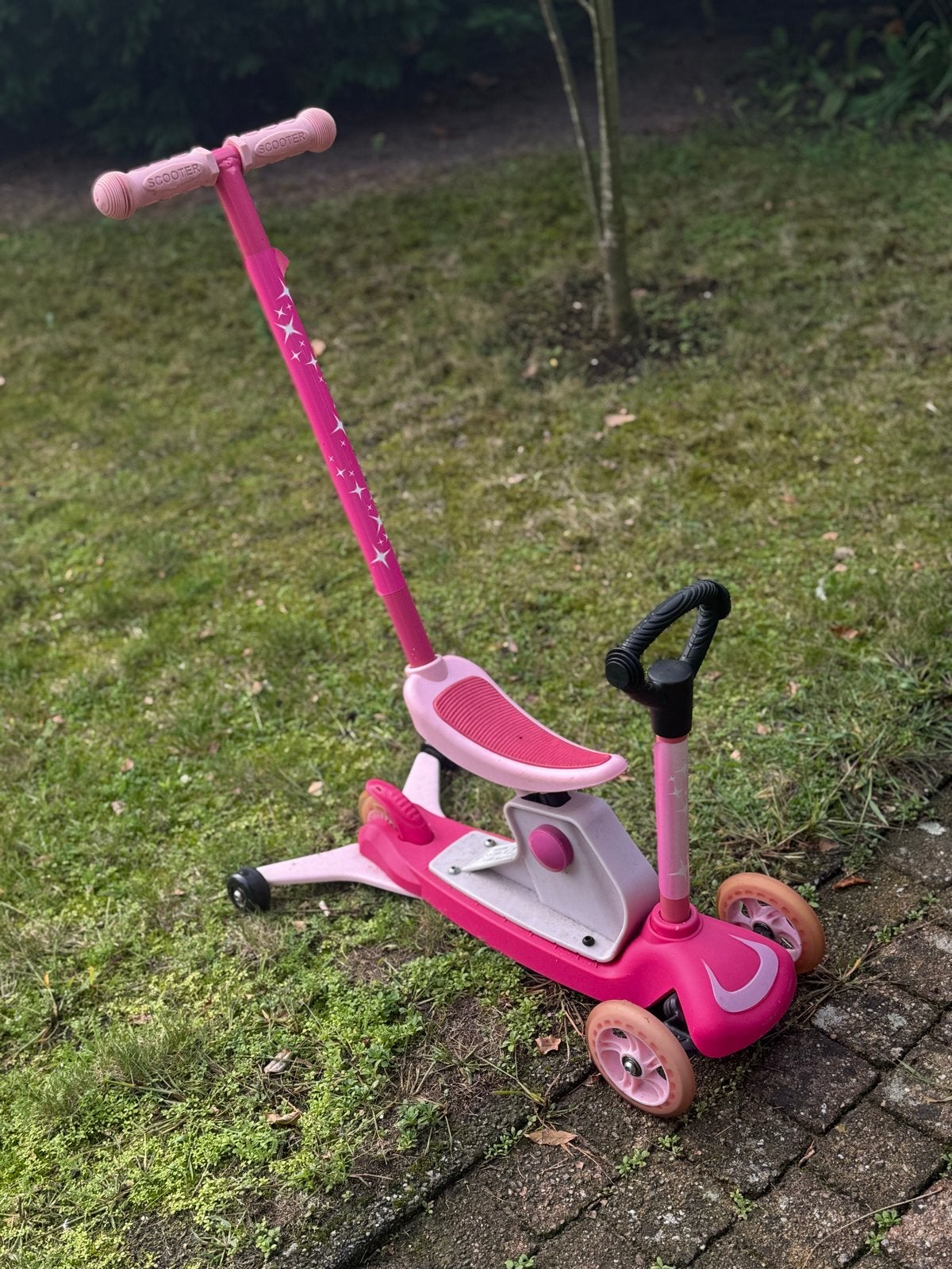 Roze kinderstep met zitje - 2-in-1