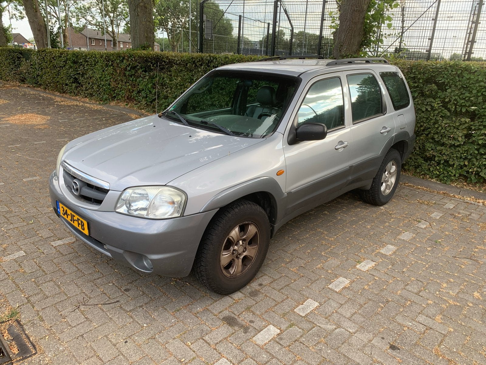 Mazda Tribute 3.0 V6 Touring AUT 4WD 2002 Grijs, Automaat, 4x4, Particulier, 93 €/maand