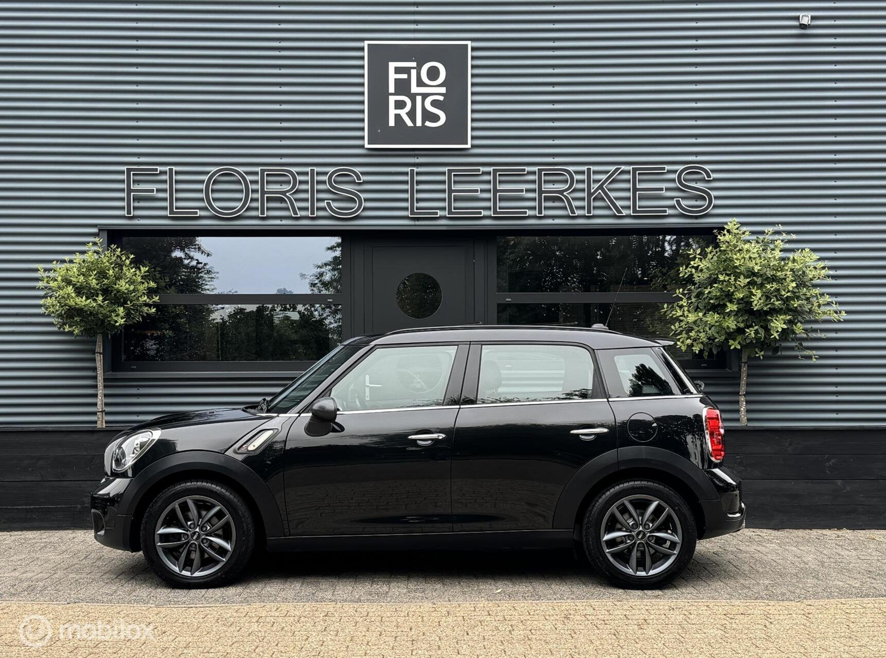 Mini Countryman 2.0 SD ALL4 | Pano dak | Xenon | Zwart Leer, Auto's, Automaat, Euro 5, Zwart, Leder
