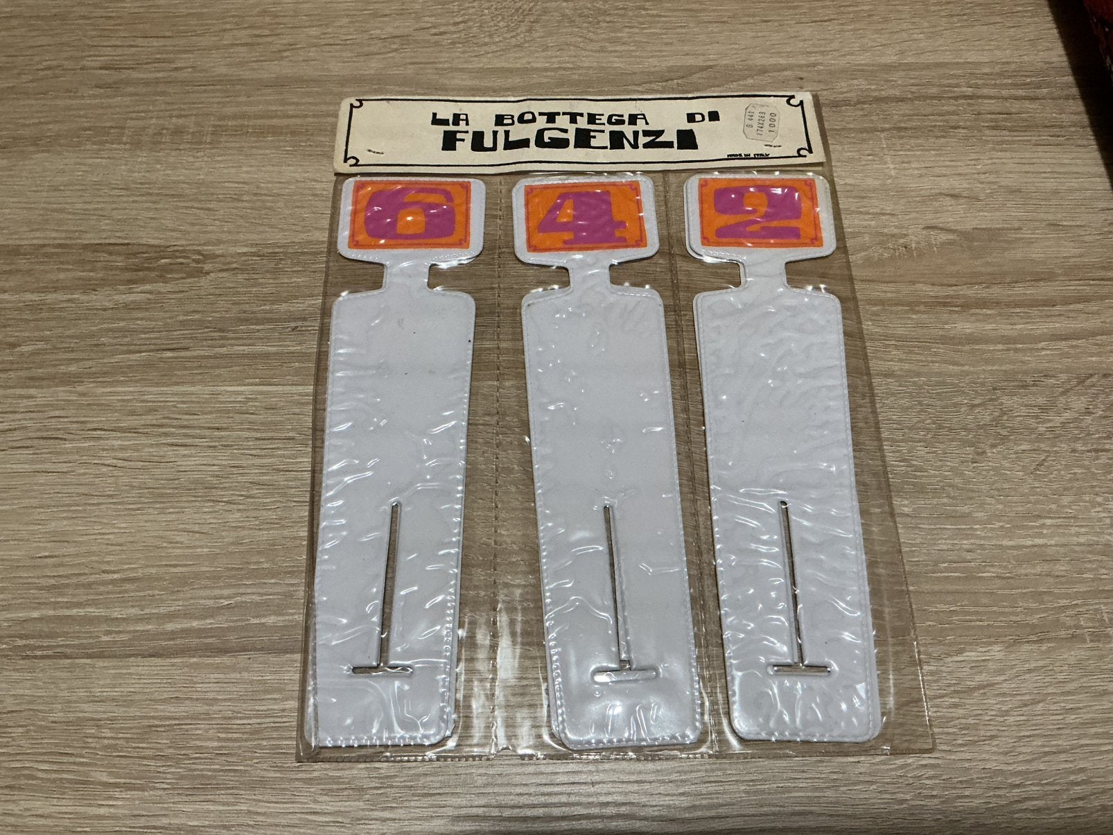 Vintage La Bottega Di Fulgenzi Servetringen - Oranje, Huis en Inrichting, Keuken | Bestek, Kunststof, Nieuw, Ophalen of Verzenden