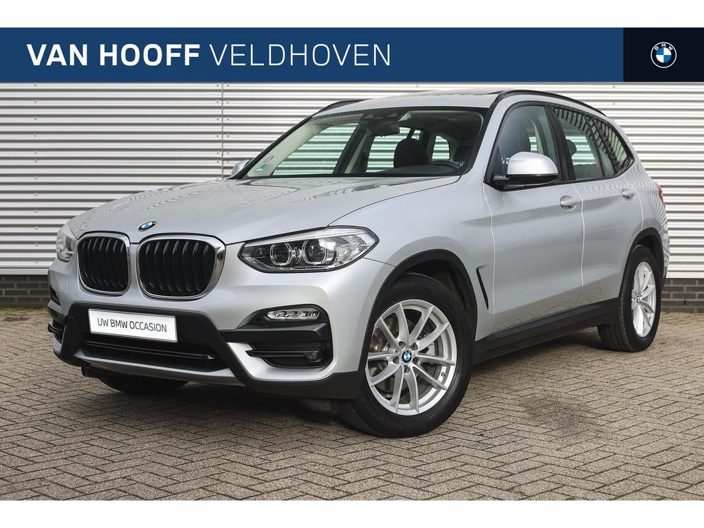 BMW X3 xDrive20i Automaat / Panoramadak / Trekhaak / Sportst, Auto's, Gebruikt, Euro 6, 4 cilinders, Leder en Stof
