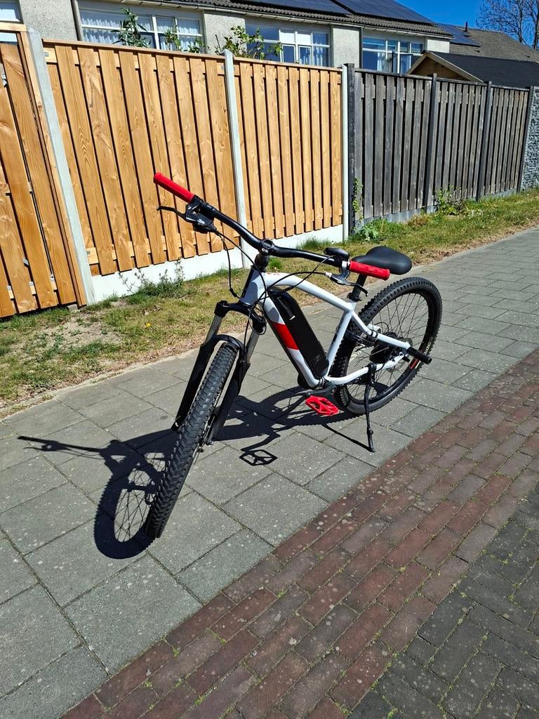 Rockrider EST100 E-MTB, Ophalen, Gebruikt, 30 tot 50 km per accu, Overige merken