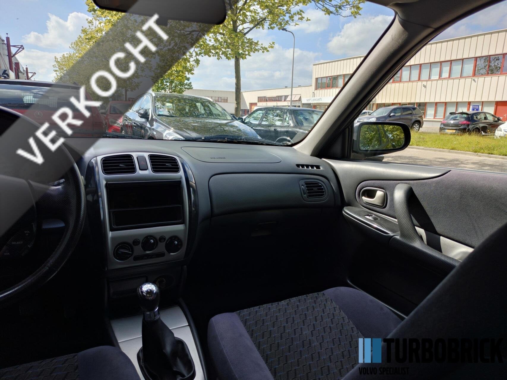 Mazda 323 Fastbreak 2.0i Sportive |Airco|16"|Youngtimer|Clas, Auto's, Voorwielaandrijving, Stof, Gebruikt, Zwart