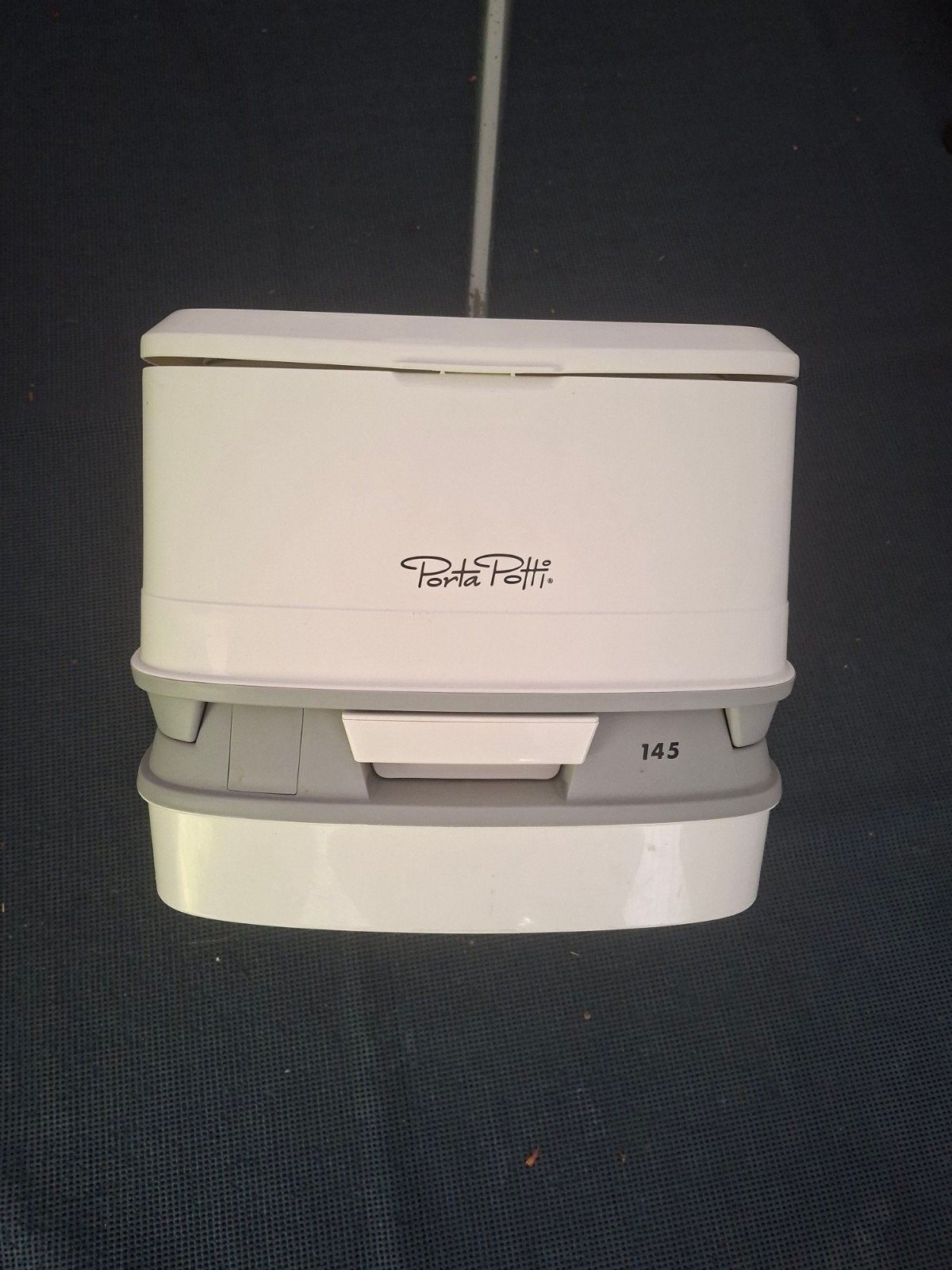 Porta Potti 145, Ophalen, Zo goed als nieuw