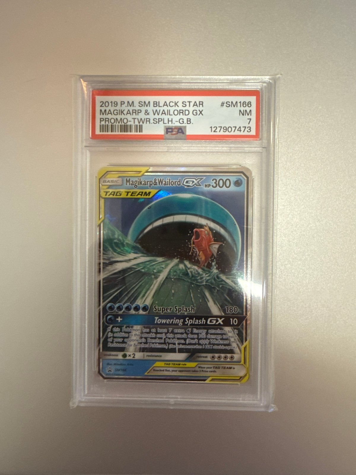 Magikarp & Wailord GX #SM166, PSA 7, Promo Pokemon slab, Ophalen of Verzenden, Zo goed als nieuw