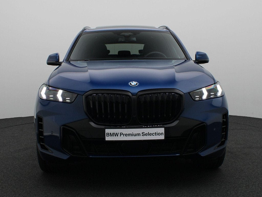 BMW X5 xDrive50e M Sportpakket Pro | Travel Pack | Innovatio, Gebruikt, 2395 kg, Met garantie (alle), Blauw