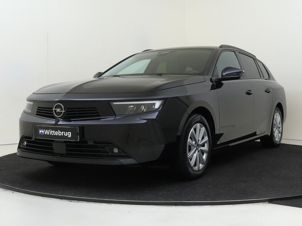 Opel Astra Sports Tourer 1.2 Turbo 110PK Business Edition Ke, Gebruikt, 1199 cc, Handgeschakeld, 19 km/l