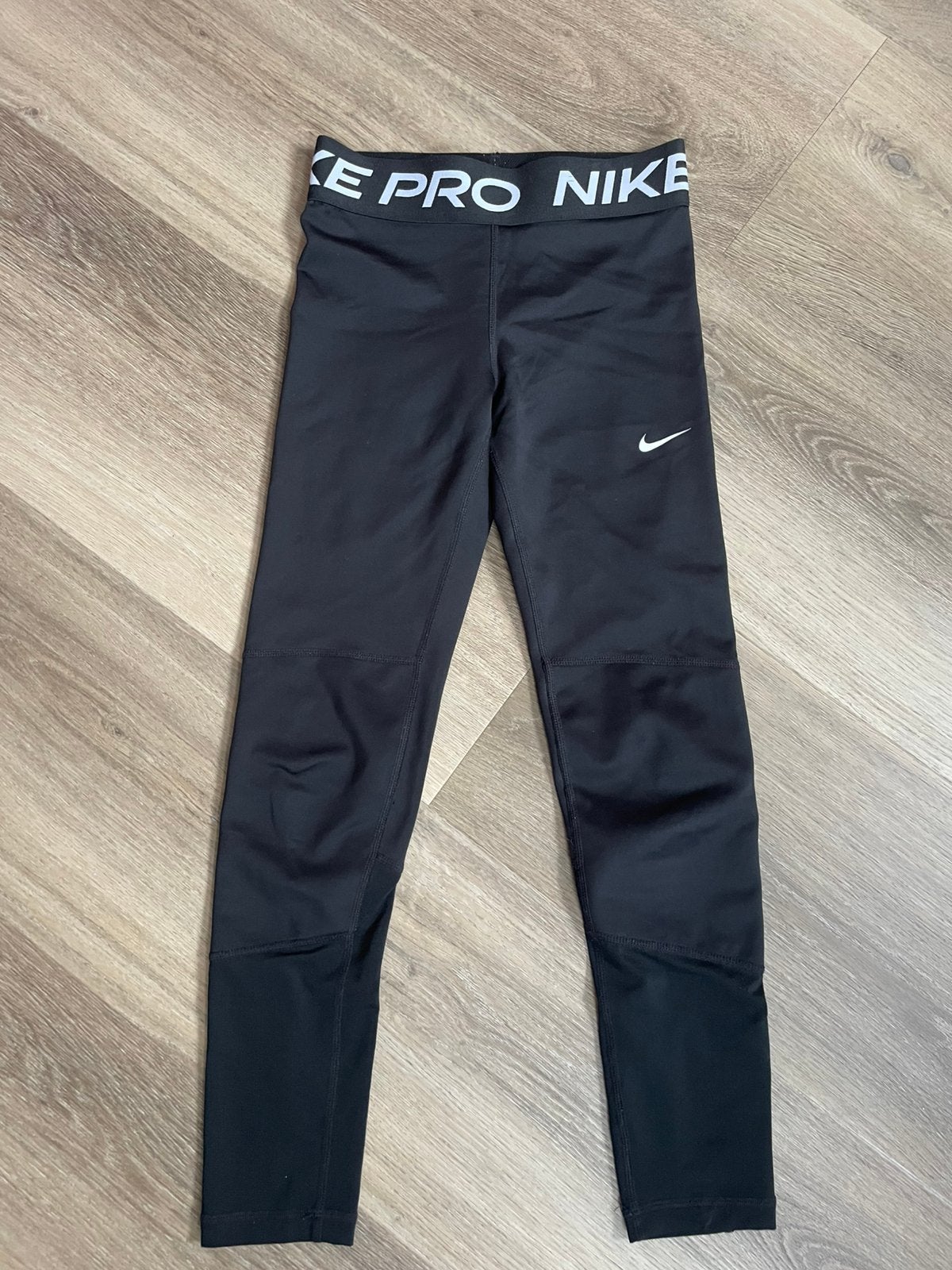 Zwarte Nike sportlegging maat 140, Ophalen of Verzenden, Zo goed als nieuw, Jongen of Meisje, Broek