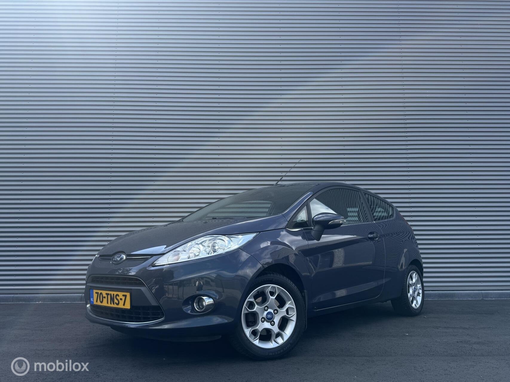 Ford Fiesta 1.25 Titanium | Clima | Cruise | PDC, Auto's, Voorwielaandrijving, Euro 5, 4 cilinders, 82 pk