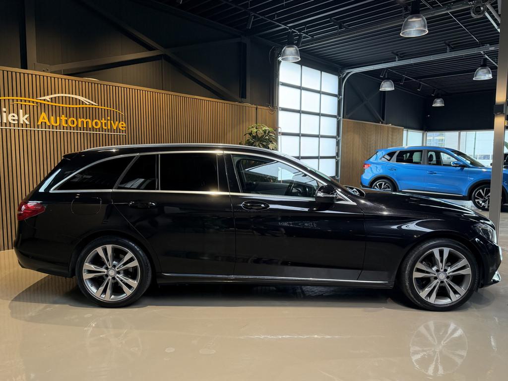 Mercedes-Benz C-Klasse Estate 180 Prestige Navigatie Half le, Auto's, Mercedes-Benz, Achterwielaandrijving, Gebruikt, Leder en Stof
