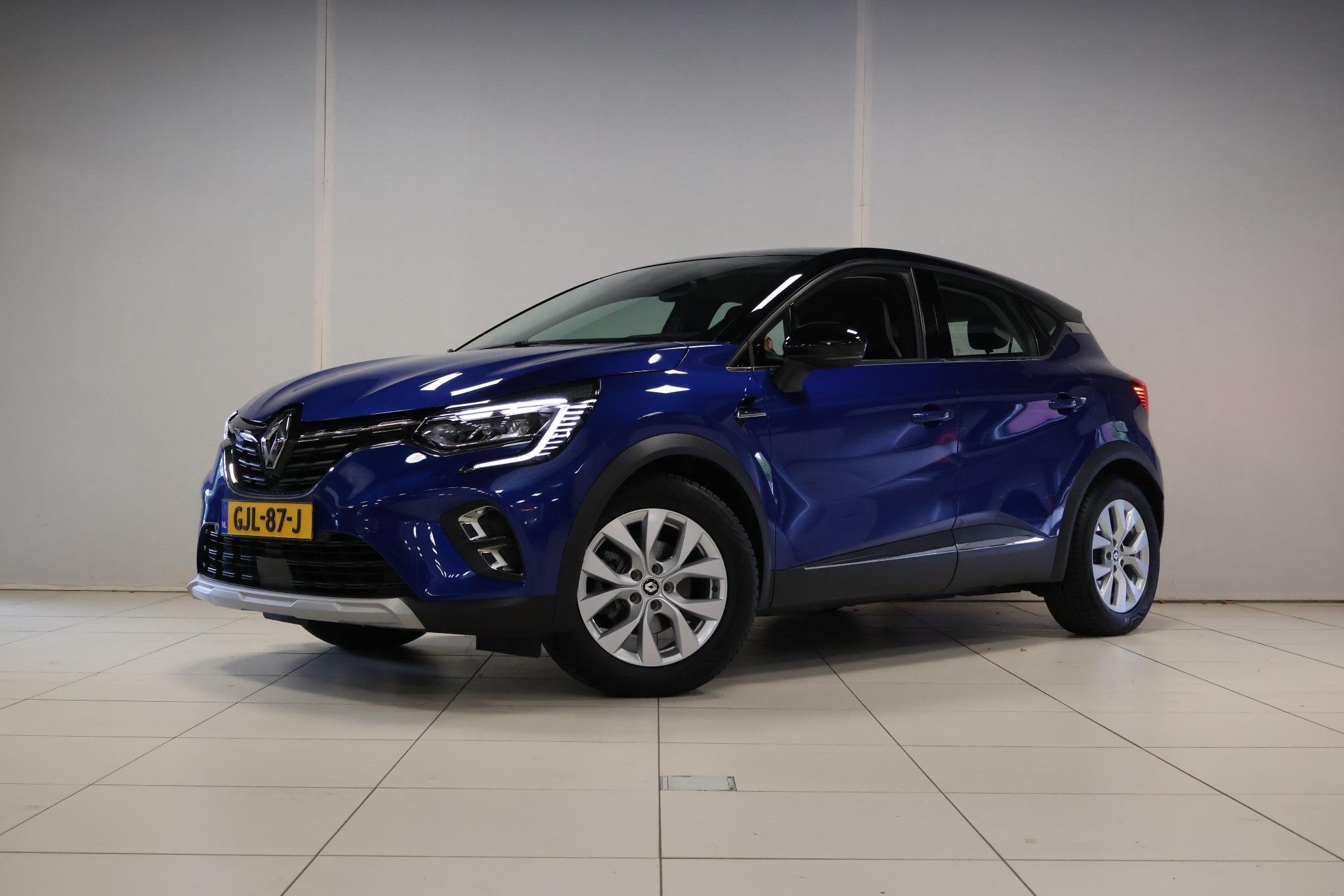 Renault Captur 1.6 E-Tech Plug-in Hybrid 160 Intens, Auto's, Renault, 4 cilinders, Blauw, Leder en Stof, Plug-in hybride