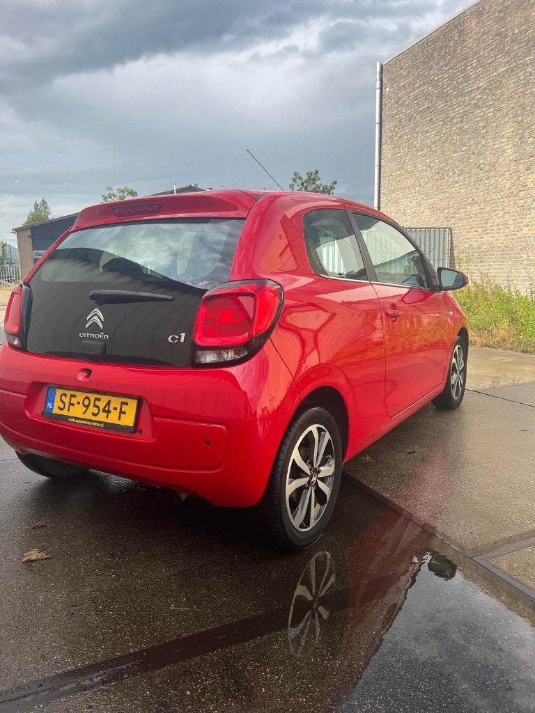 Citroën C1 1.2 60KW 3-DRS 2015 Rood, Voorwielaandrijving, Stof, 1199 cc, 840 kg