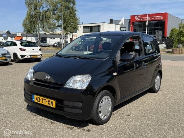 Daihatsu Cuore 1.0-12V Nagano, Auto's, Daihatsu, Zwart, 18 €/maand, Elektrische ramen, Cuore
