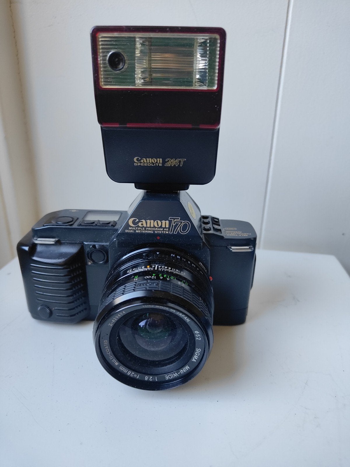Canon T70 Spiegelreflexcamera met Sigma Wide lens en fli, Ophalen of Verzenden, Gebruikt, Spiegelreflex, Canon
