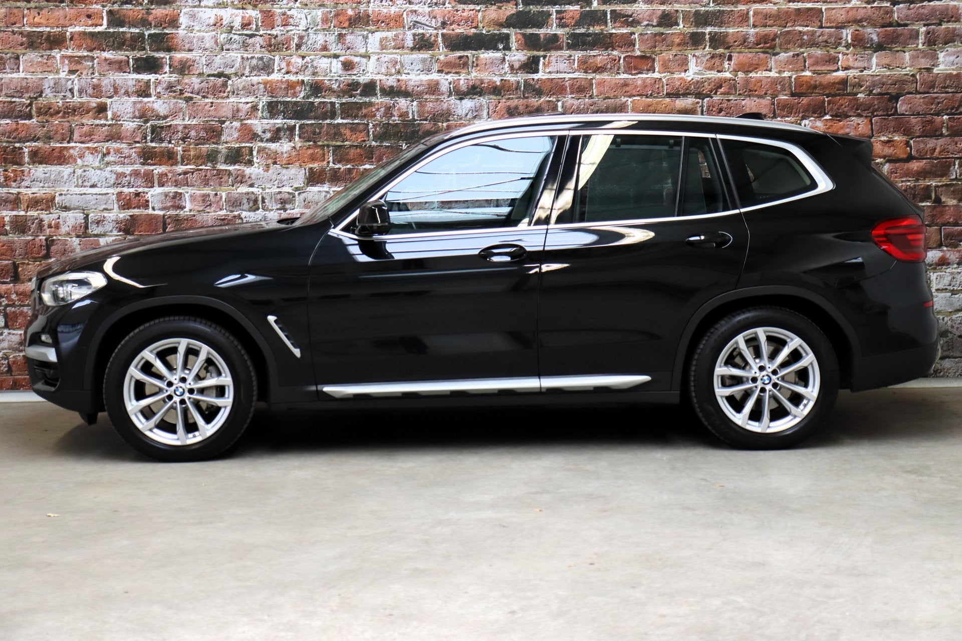 BMW X3 xDrive30i High Executive xLine Automaat / Panoramadak, Gebruikt, 4 cilinders, 252 pk, Zwart
