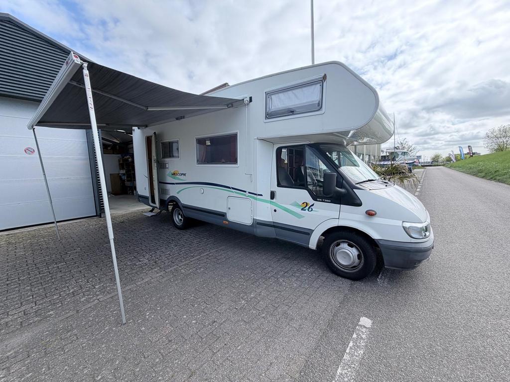 Ford Trigano FD1 7 persoons alkoof camper dubbel lucht, Caravans en Kamperen, Campers, Alkoof, Ringverwarming, Fietsendrager, Douche