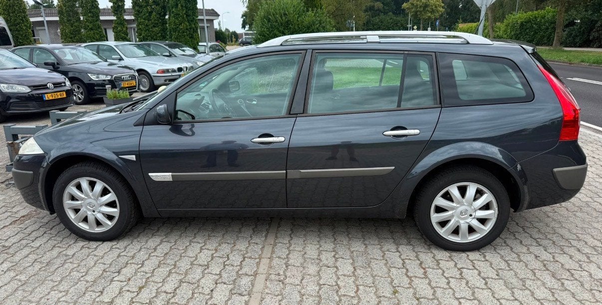 Renault Mégane Grand Tour 2.0-16V Privilège, Auto's, Renault, 135 pk, Gebruikt, 4 cilinders, Leder en Stof
