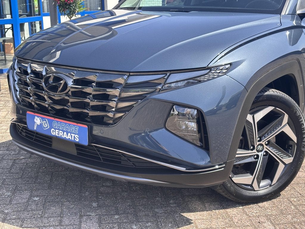 Hyundai Tucson 1.6 T-GDI PHEV Premium 4WD l Panoramadak, Sto, Auto's, Hyundai, Automaat, Lichtsensor, 14 kWh, Gebruikt