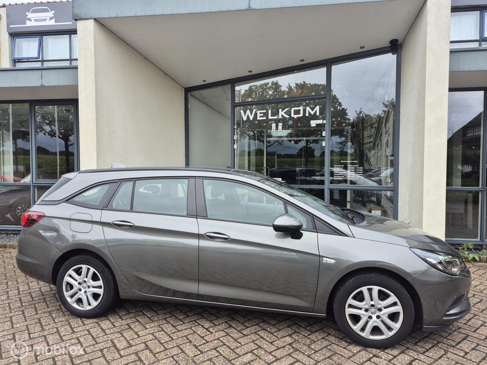 Opel Astra Sports Tourer 1.0 Innovation 1e eig.✅|Carplay, Voorwielaandrijving, Stof, Euro 6, 1178 kg
