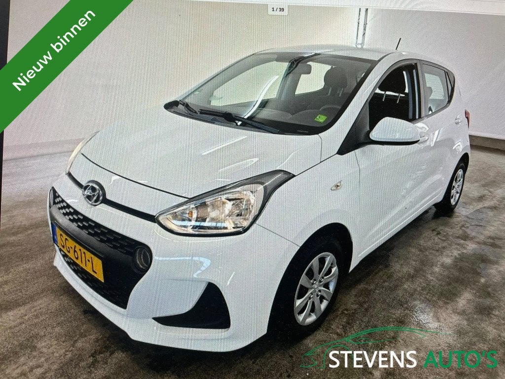 Hyundai i10 1.0i Comfort NAVIGATIE / CARPLAY / ANDROID / AIR, Auto's, Stof, Gebruikt, 4 stoelen, Wit