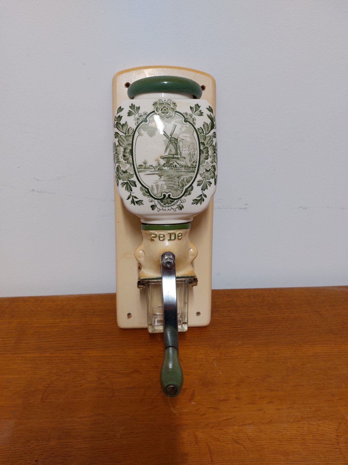 wand koffiemolen, Ophalen
