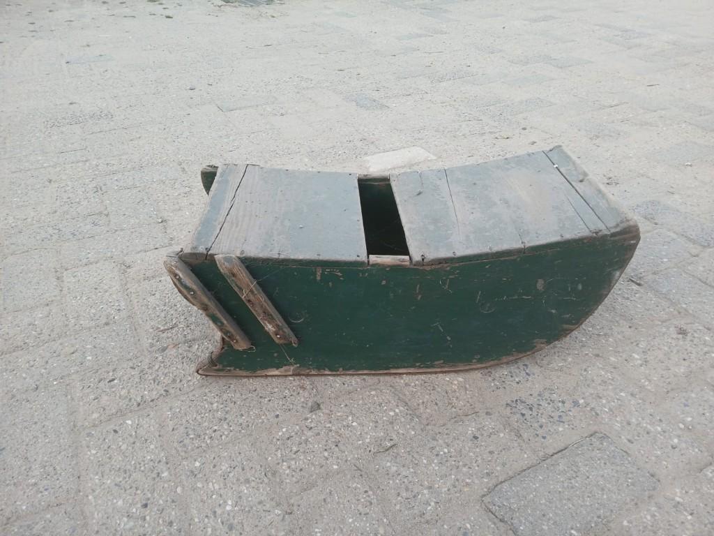 antieke slee, Ophalen