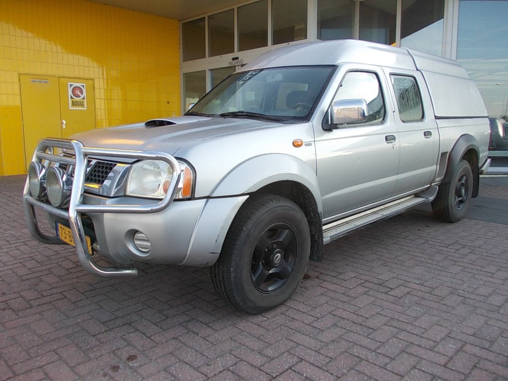 Nissan Pickup (D22) KING CAB 4X4 DC 5-PERS. (NAVARA) LEES TE, Auto's, Stof, Gebruikt, 4 cilinders, Origineel Nederlands