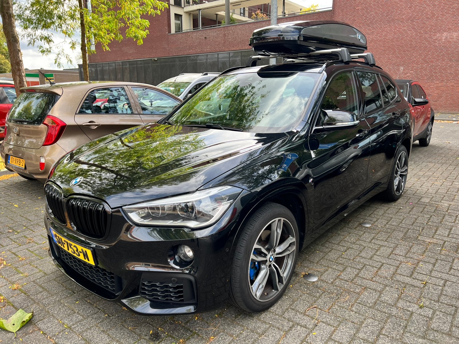 BMW X1 Sdrive20i Black Shadow 192pk Aut 2018 Zwart NAP, Auto's, 1998 cc, 1800 kg, Zwart, Bruin
