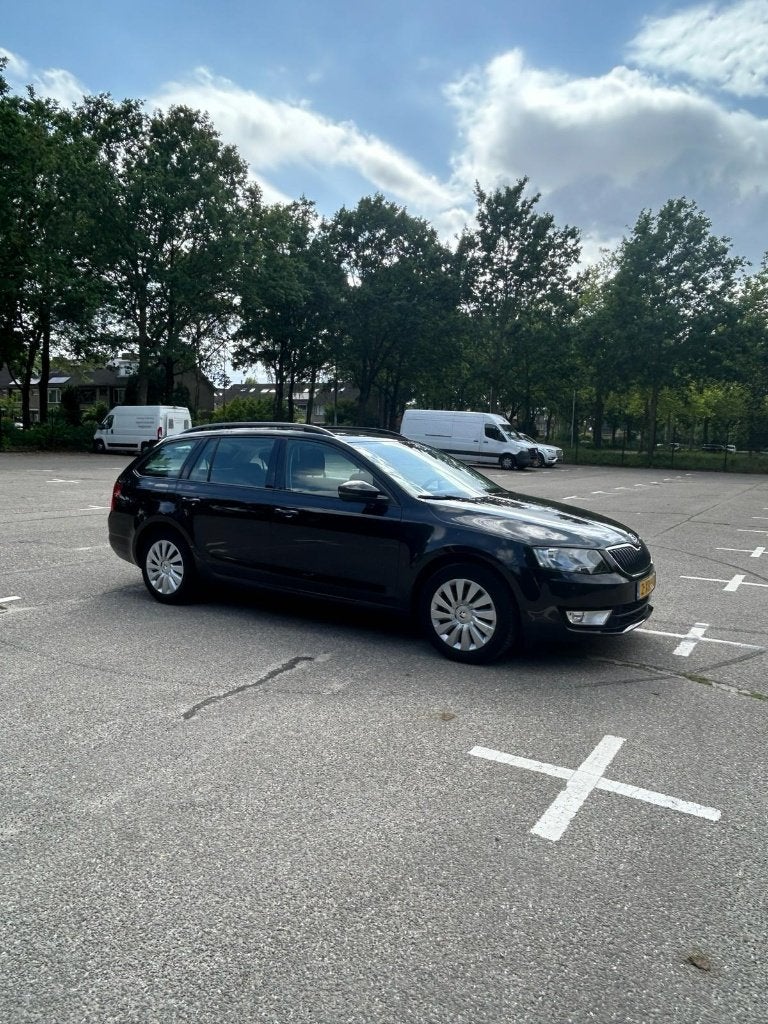 Skoda Octavia 1.4 TSI 103KW Combi 2014 Zwart, Auto's, Skoda, Voorwielaandrijving, Stof, Euro 6, 4 cilinders