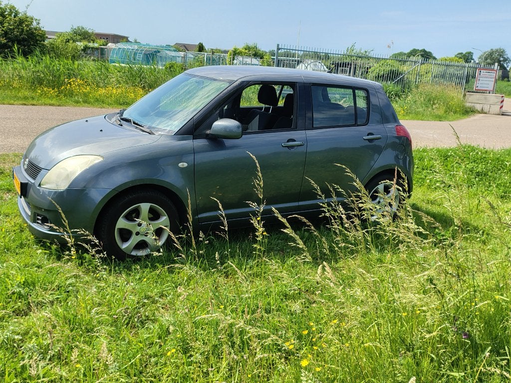 Suzuki Swift 1.3 5DRS 2006 Grijs 161.000 KM, Auto's, Suzuki, Voorwielaandrijving, Stof, 40 €/maand, 965 kg