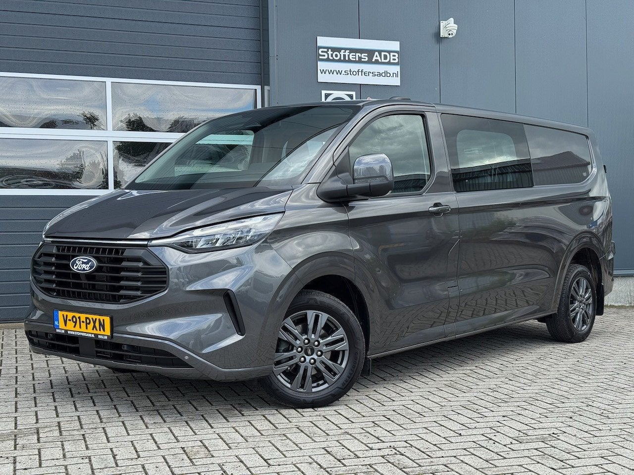 Ford Transit Custom 320 2.0 TDCI 170pk AWD L2H1 Limited DC A, Stof, Gebruikt, Euro 6, 4 cilinders