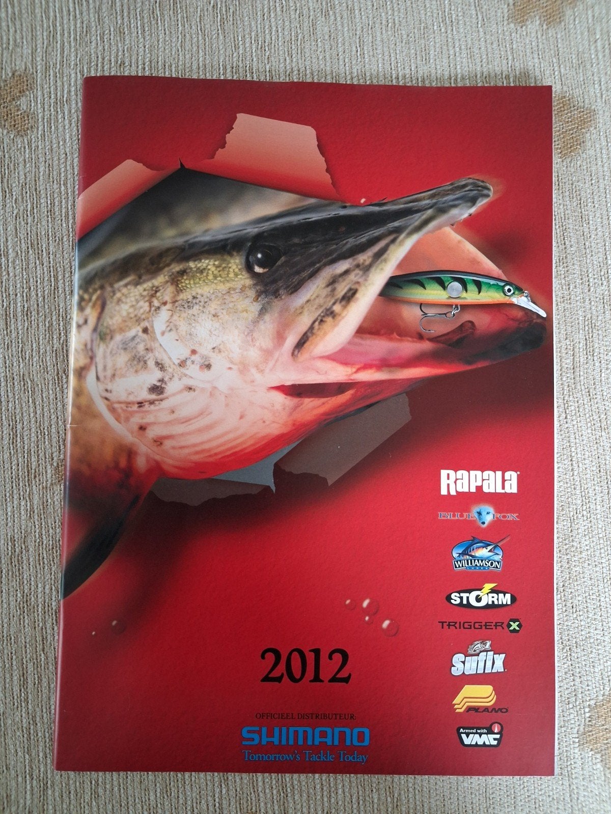 Hengelsportcatalogus Shimano 2012 kunstaas, Watersport en Boten, Ophalen of Verzenden, Gebruikt, Boek of Tijdschrift