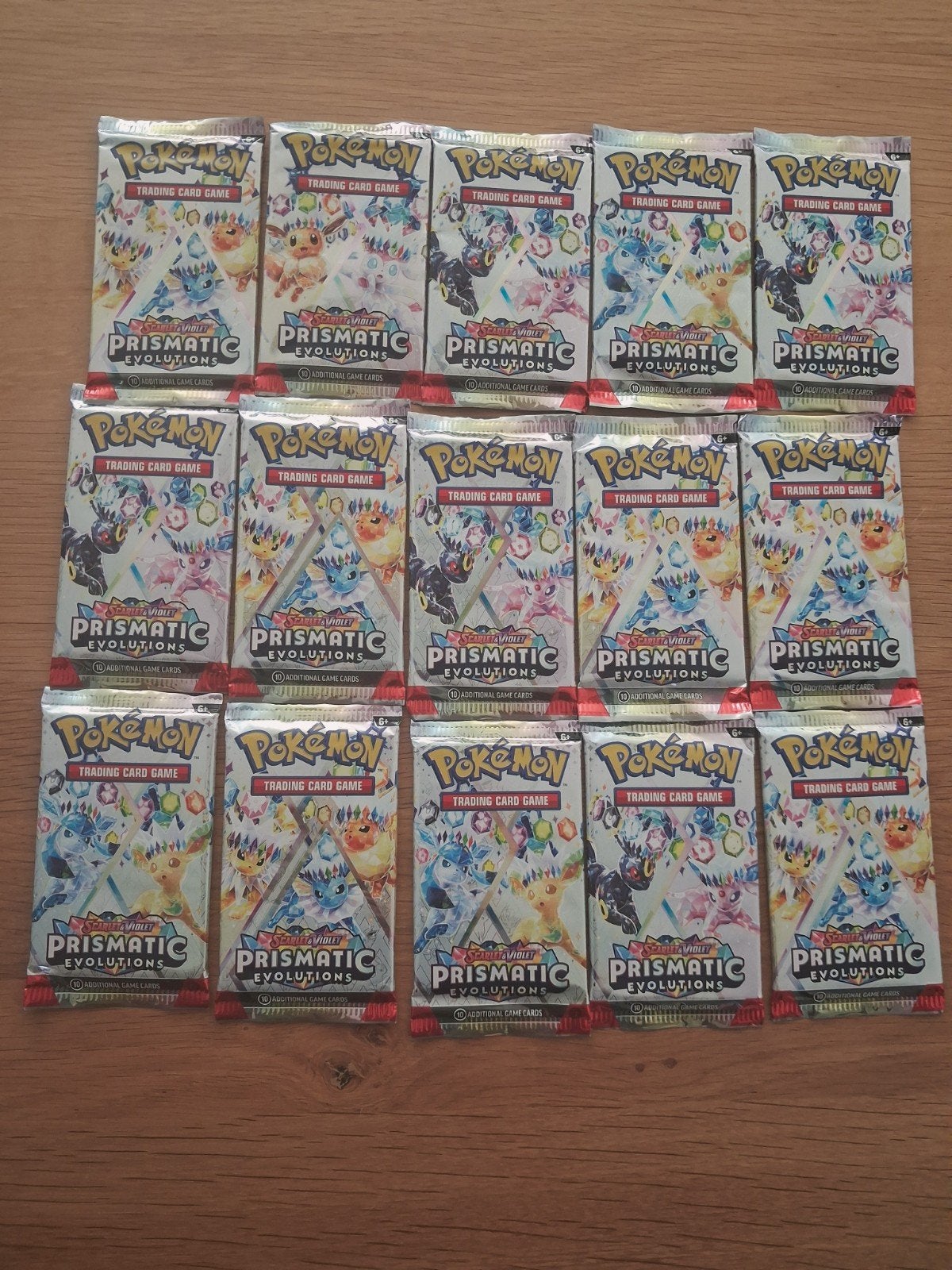 15x Pokémon Prismatic Evolutions Booster Packs, Hobby en Vrije tijd, Verzamelkaartspellen | Pokémon, Ophalen, Zo goed als nieuw