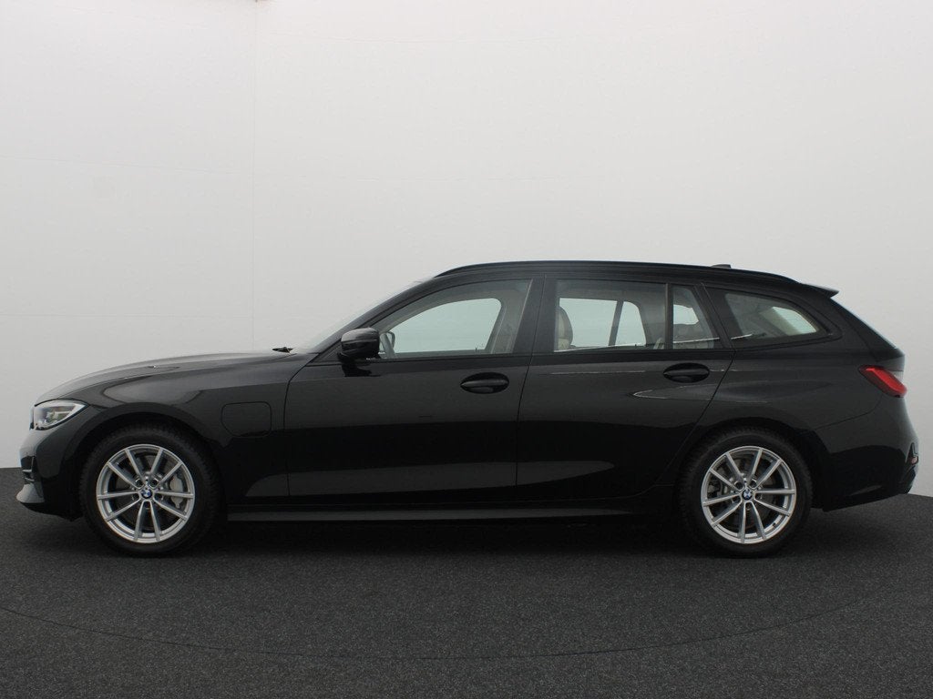 BMW 3-serie Touring 330e Business Edition Plus SPORTSTOELEN, Auto's, 1998 cc, Achterwielaandrijving, Gebruikt, Zwart