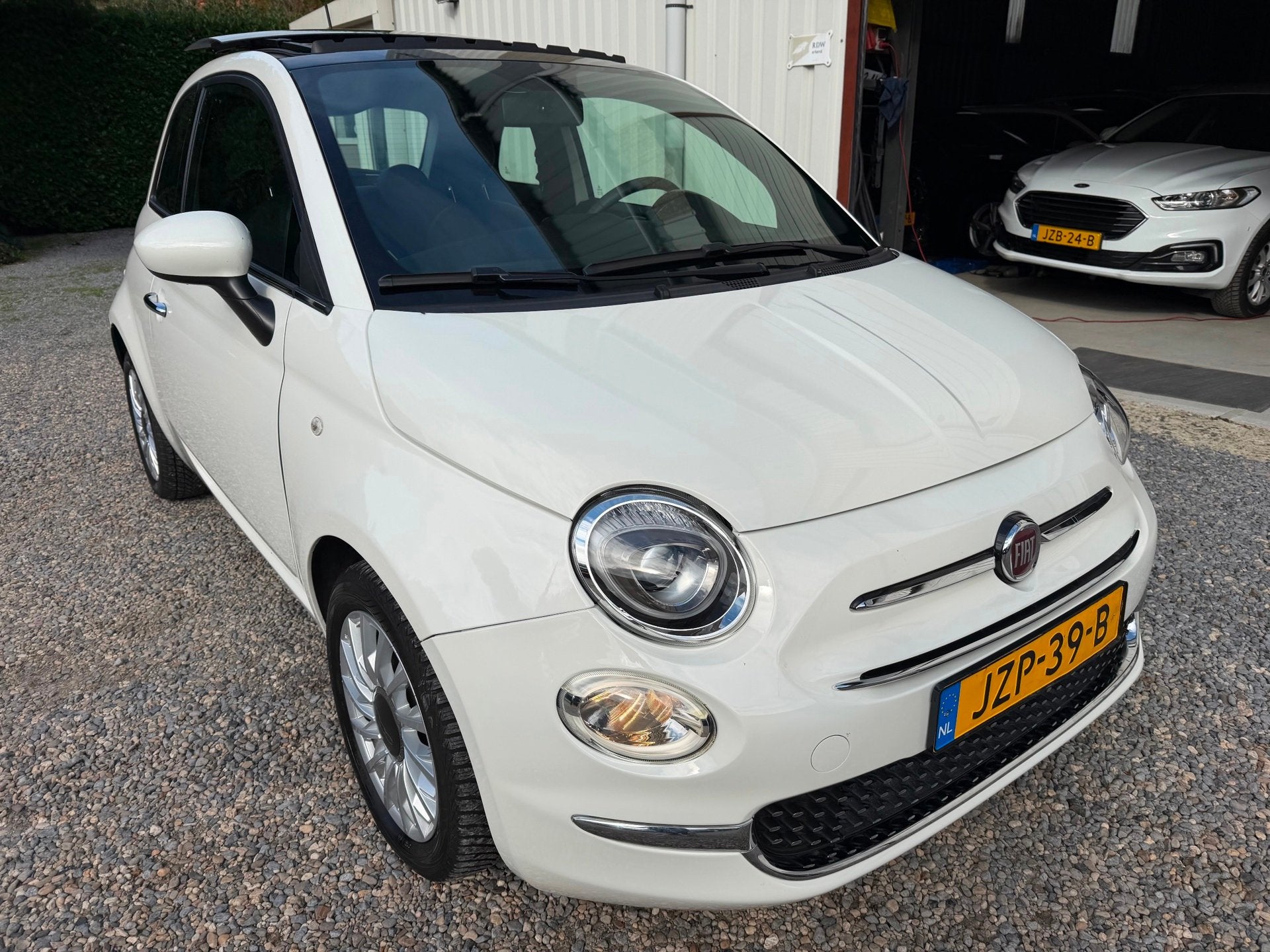 Fiat 500 1.0 Hybrid Dolcevita PANORAMADAK.LEER.NEW-APK!, Auto's, Voorwielaandrijving, Gebruikt, 4 stoelen, Automatische klimaatregeling