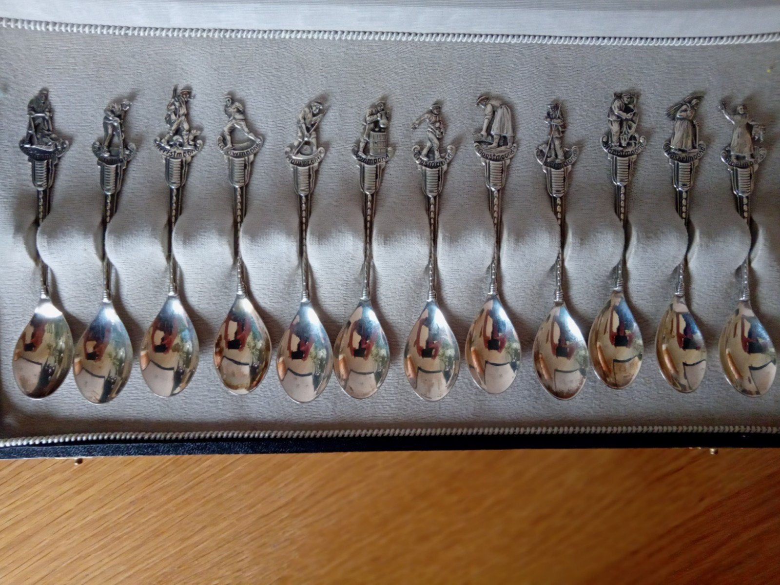 Set van 12 massieve zilveren (835) lepels, Ophalen of Verzenden, Zilver