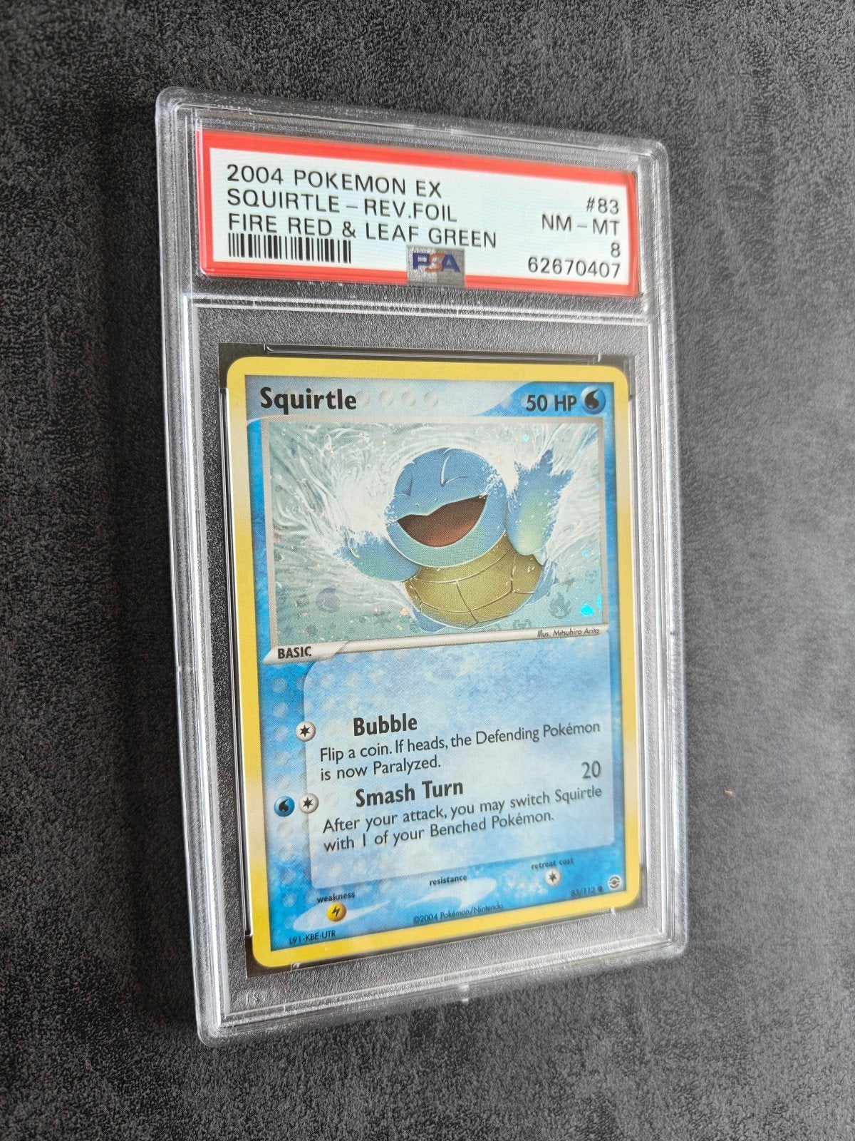 Squirtle Reverse Fire Red Leaf Green PSA 8, Hobby en Vrije tijd, Ophalen of Verzenden, Zo goed als nieuw, Losse kaart, Foil