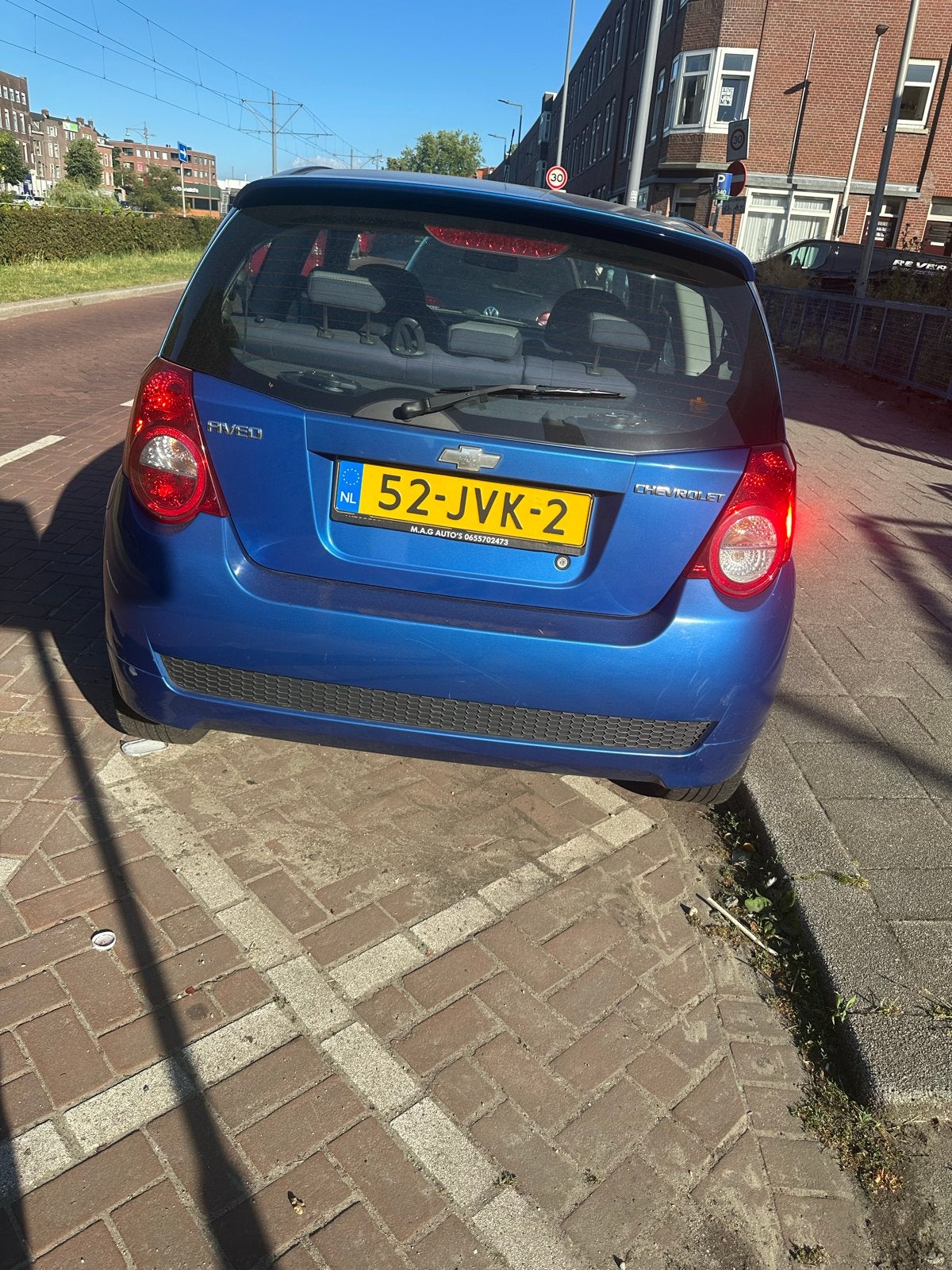 Chevrolet Aveo 1.4 16V 3D 2009 Blauw, Auto's, Voorwielaandrijving, 40 €/maand, Aveo, 100 pk
