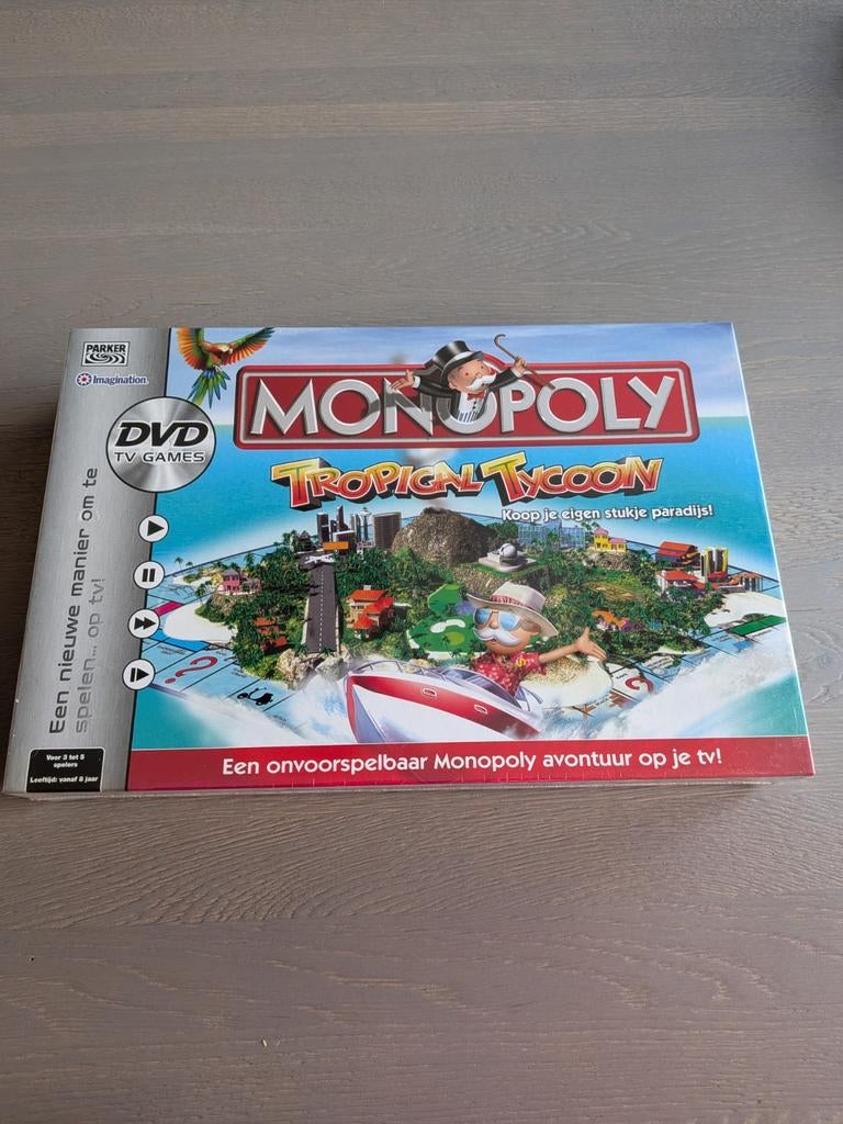 Monopoly Tropical Tycoon DVD TV Games - Nieuw in plastic, Hobby en Vrije tijd, Gezelschapsspellen | Bordspellen, Vijf spelers of meer