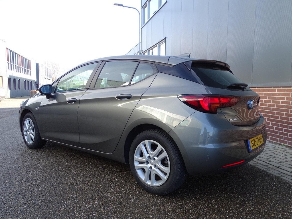 Opel Astra 1.0 Online Edition AUTOMAAT | DODEHOEK DETECTIE |, Stof, Gebruikt, 610 kg, 23 km/l