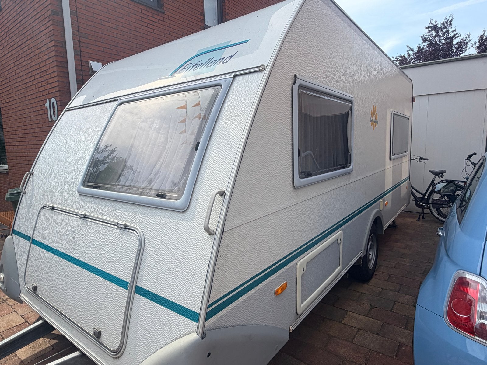 Eiffelland Holiday 450 met Mover, Luifel en Voortent, Caravans en Kamperen, Mover, Vast bed, Rondzit, 4 tot 5 meter