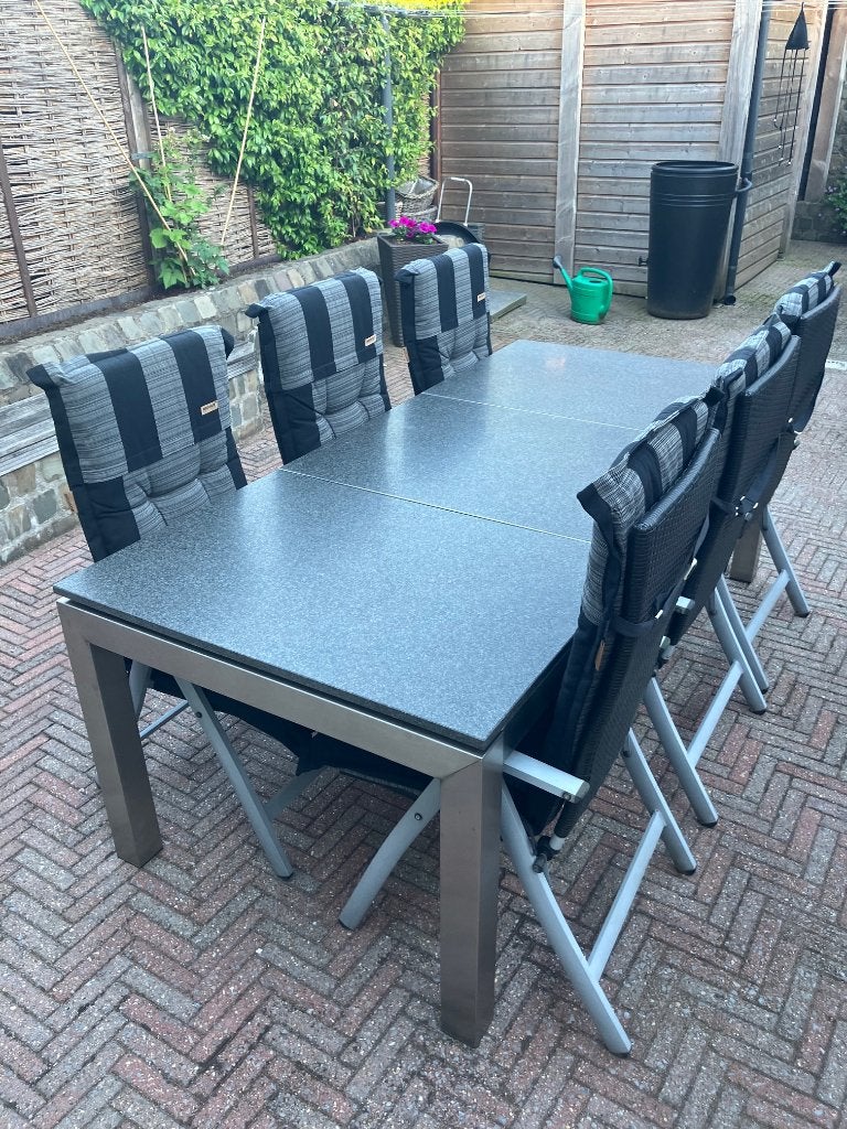 Tuintafel rvs frame en granieten blad, 6 stoelen en kussens., Ophalen, Zo goed als nieuw, Rechthoekig, Rvs