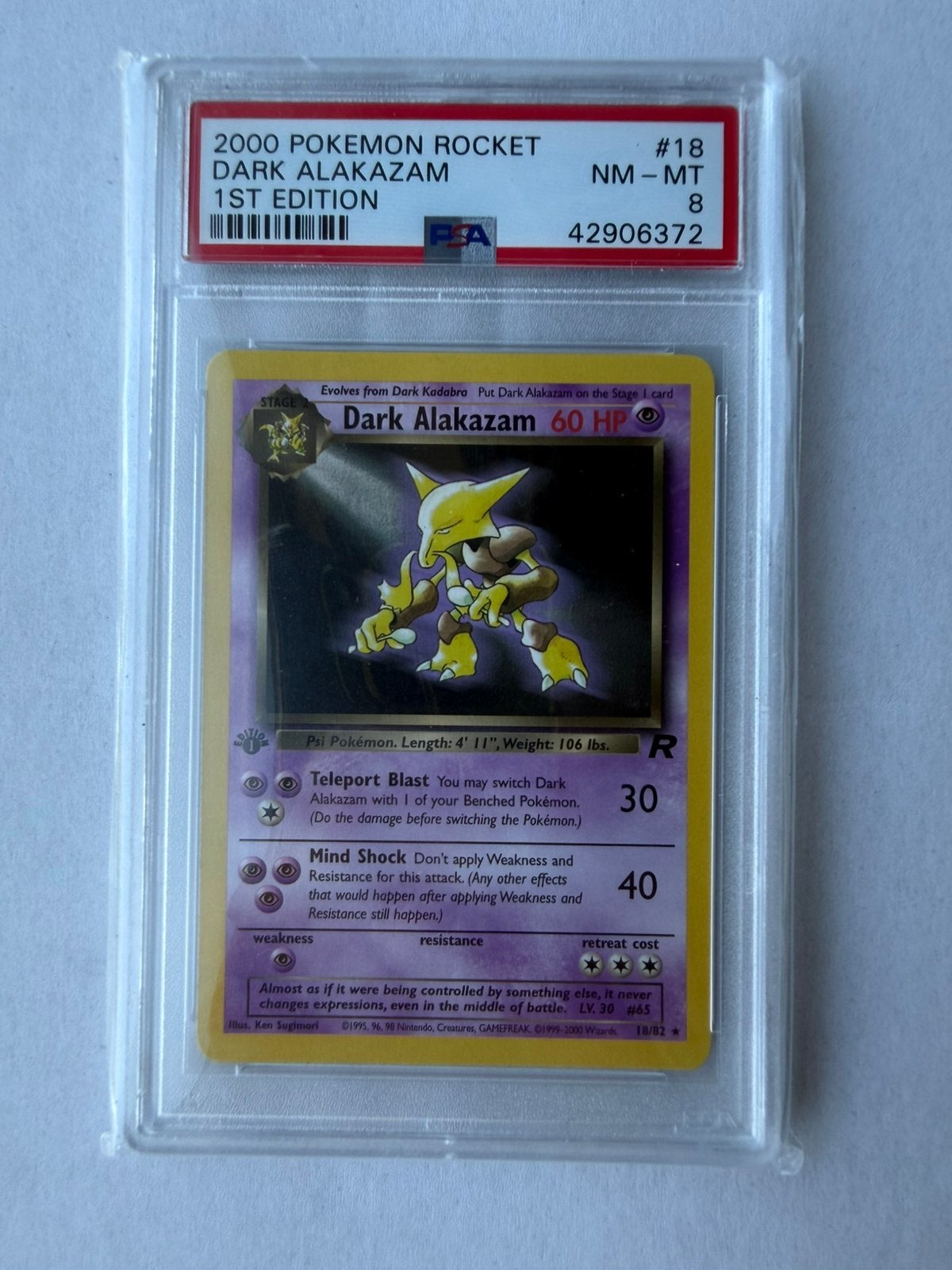 Dark Alakazam1st Edition 18/82 Team Rocket PSA 8 NM-MT, Ophalen of Verzenden, Zo goed als nieuw